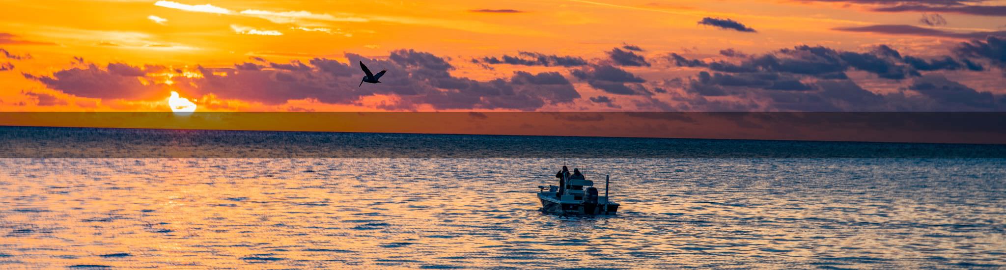 florida sunset in ocean boat
